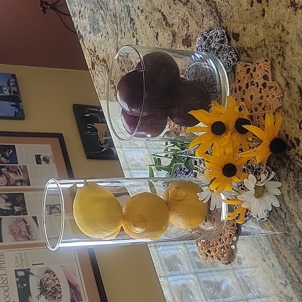 Two glass flower vases